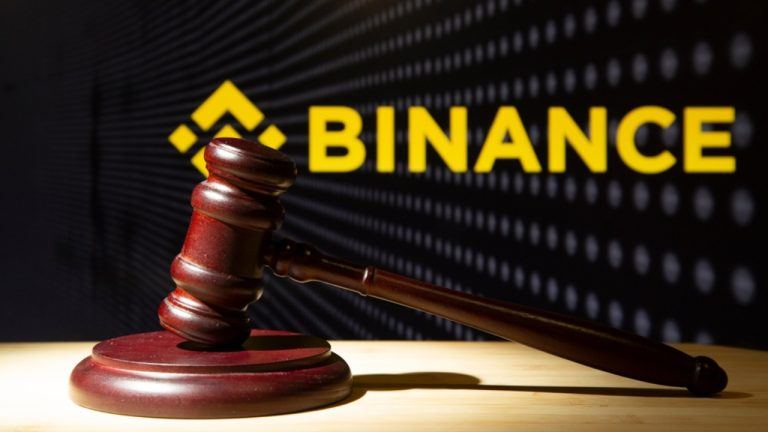 Gavel with binance logo behind
