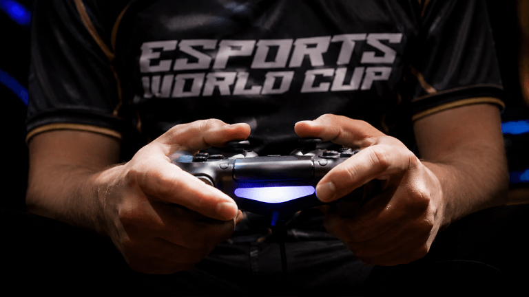 Esports player playing in the World Cup (EWC).