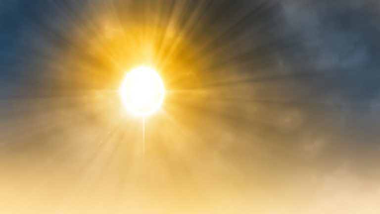 Extremely hot weather. The summer noon sun shines