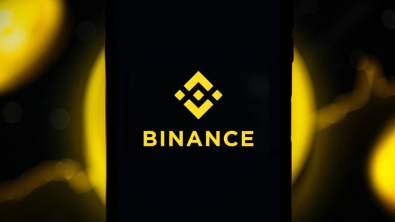Binance logo on mobile phone